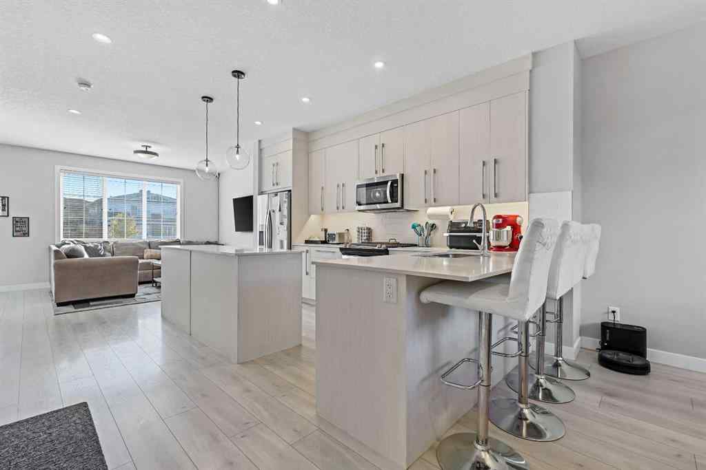 MLS® A2258533 - 193 Creekside Drive SW in Pine Creek Calgary, Residential