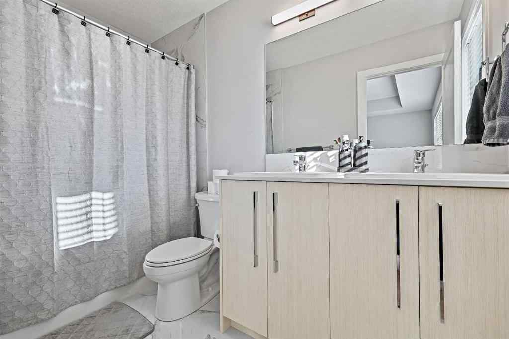 MLS® A2258533 - 193 Creekside Drive SW in Pine Creek Calgary, Residential