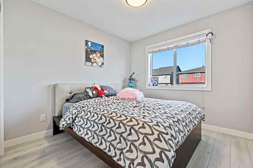 MLS® A2258533 - 193 Creekside Drive SW in Pine Creek Calgary, Residential