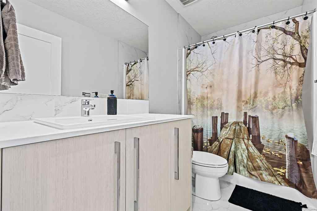 MLS® A2258533 - 193 Creekside Drive SW in Pine Creek Calgary, Residential