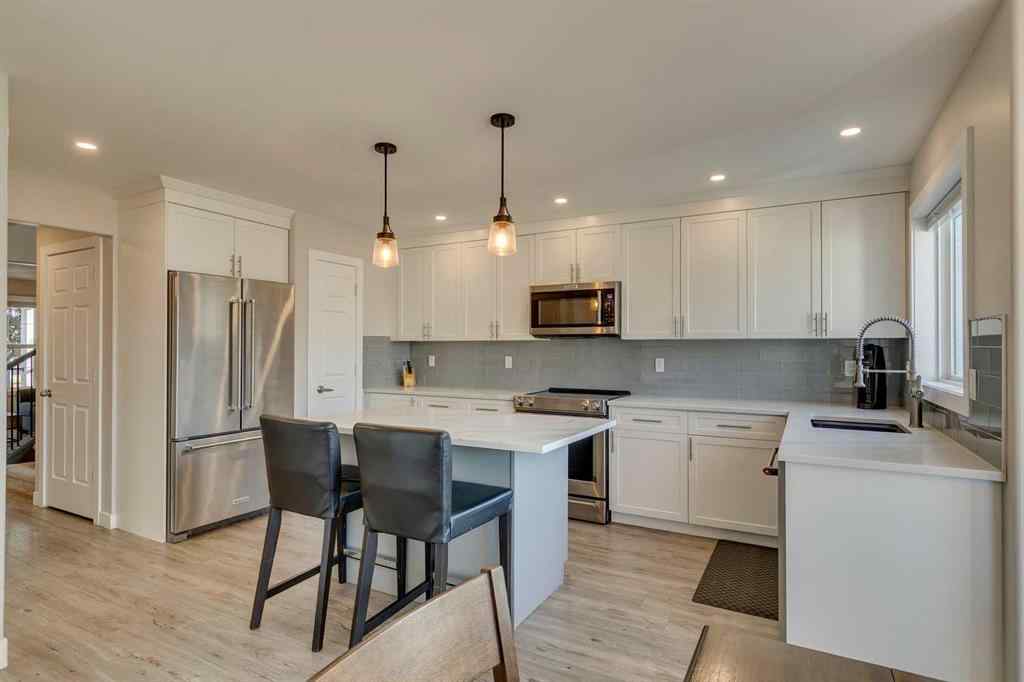 MLS® A2258556 - 7979 Wentworth Drive SW in West Springs Calgary, Residential