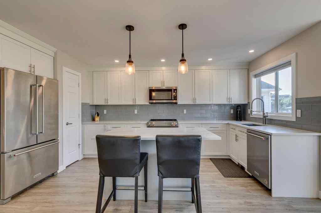 MLS® A2258556 - 7979 Wentworth Drive SW in West Springs Calgary, Residential