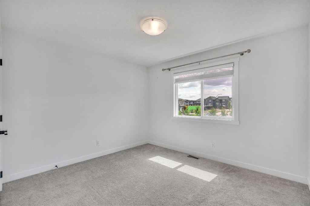 MLS® A2258564 - 274 Howse Drive NE in Livingston Calgary, Residential