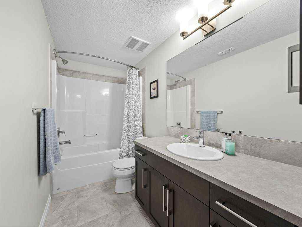MLS® A2258579 - 34 Riviera View  in Riviera Cochrane, Residential