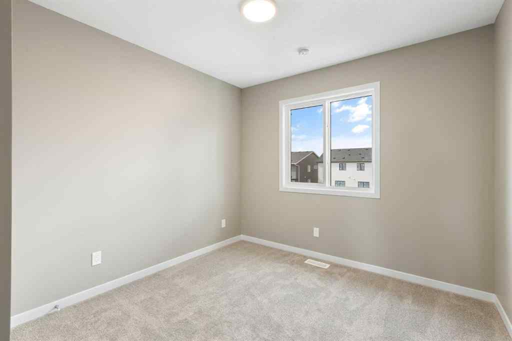 MLS® A2258581 - 415 Hotchkiss Manor SE in Hotchkiss Calgary, Residential