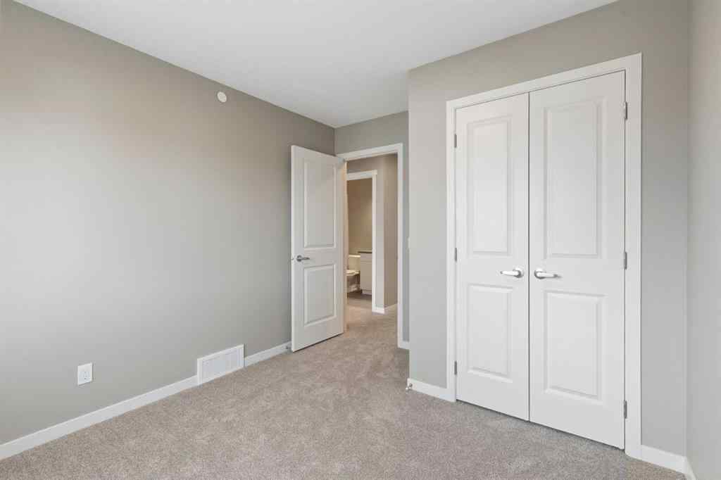 MLS® A2258581 - 415 Hotchkiss Manor SE in Hotchkiss Calgary, Residential