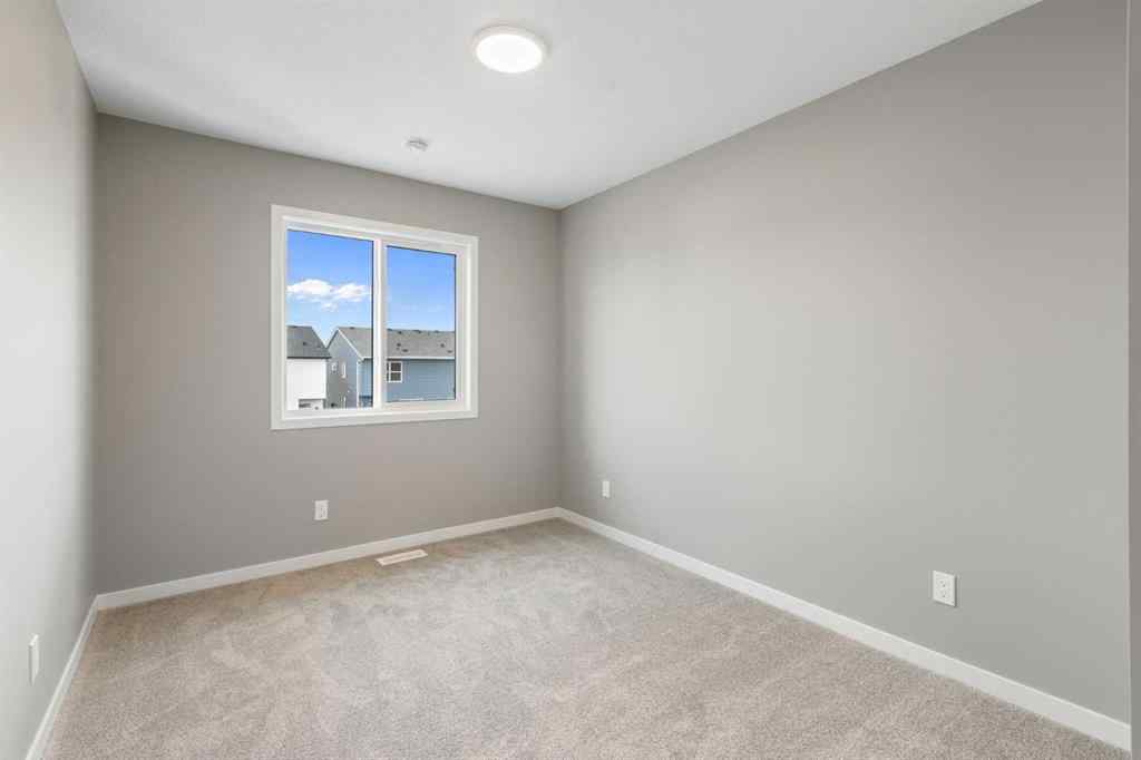 MLS® A2258581 - 415 Hotchkiss Manor SE in Hotchkiss Calgary, Residential
