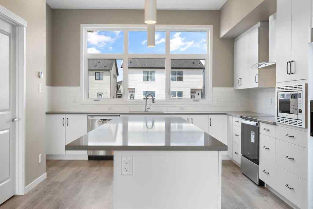 MLS® A2258581 - 415 Hotchkiss Manor SE in Hotchkiss Calgary, Residential