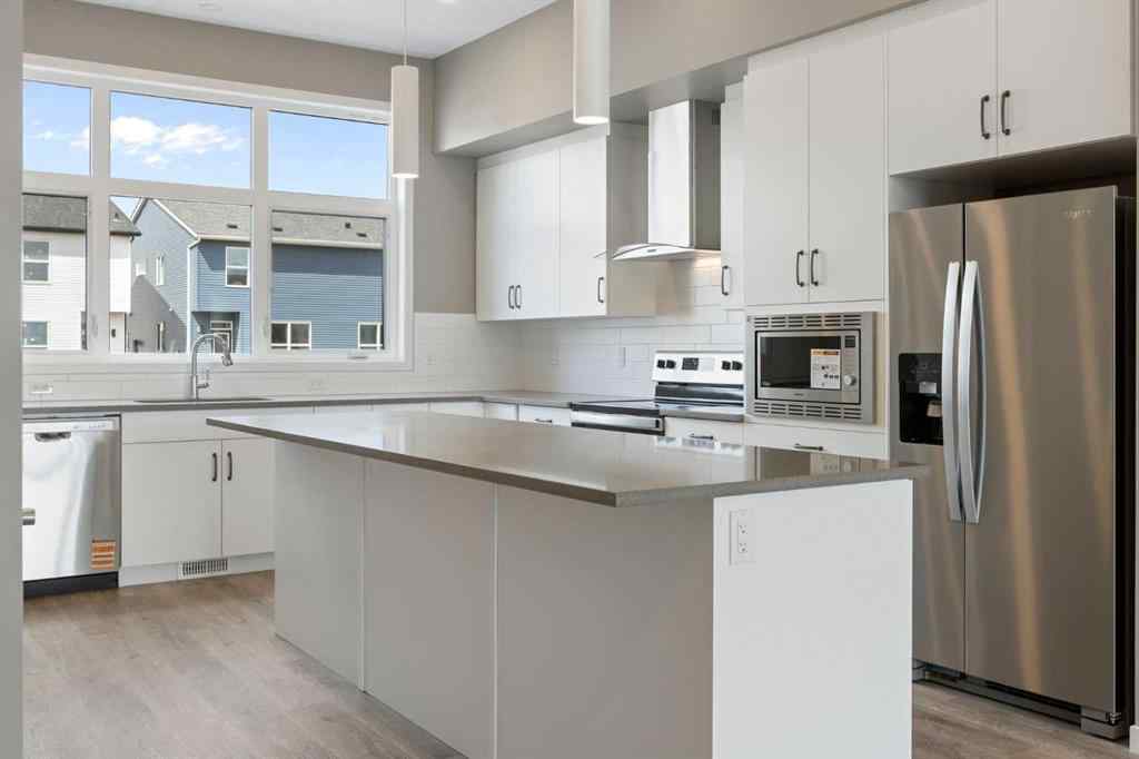 MLS® A2258581 - 415 Hotchkiss Manor SE in Hotchkiss Calgary, Residential