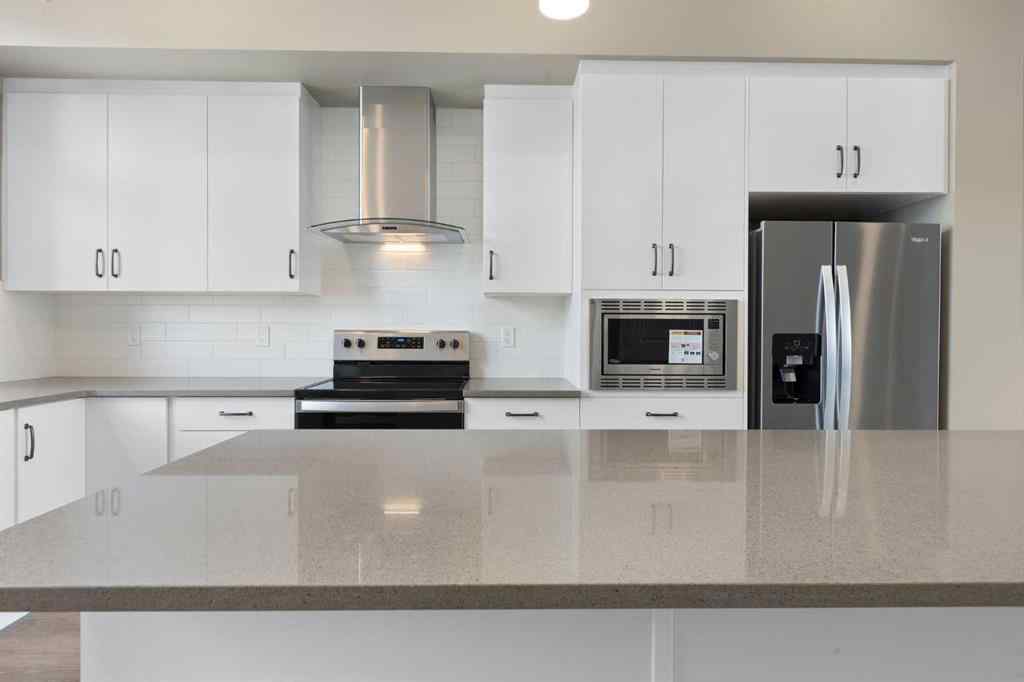 MLS® A2258581 - 415 Hotchkiss Manor SE in Hotchkiss Calgary, Residential