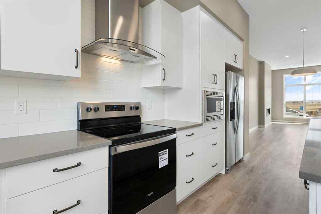 MLS® A2258581 - 415 Hotchkiss Manor SE in Hotchkiss Calgary, Residential