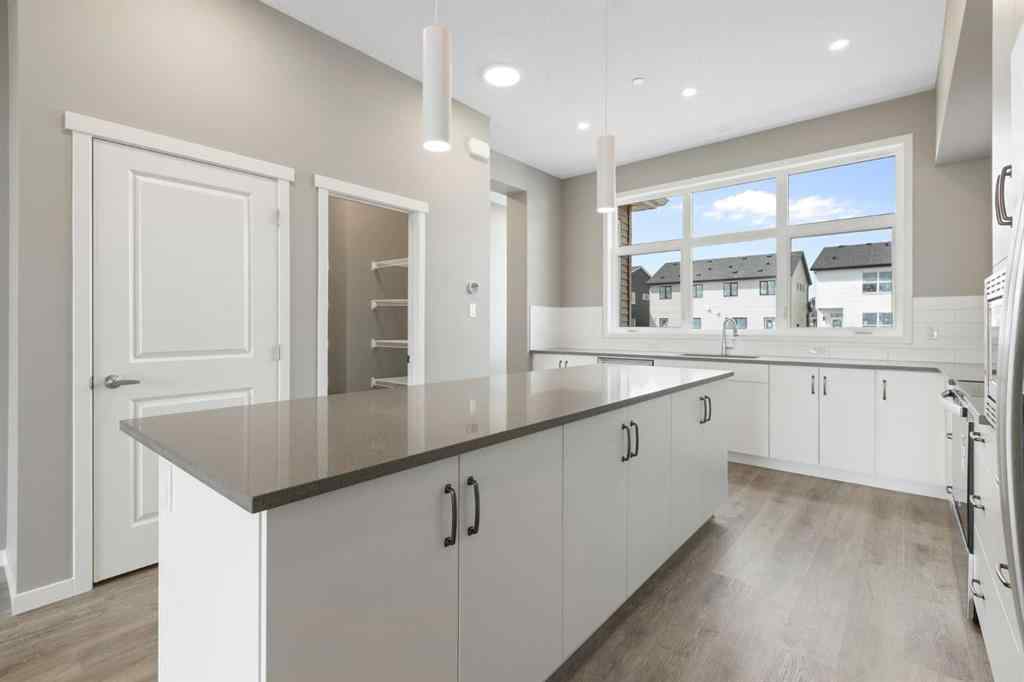 MLS® A2258581 - 415 Hotchkiss Manor SE in Hotchkiss Calgary, Residential