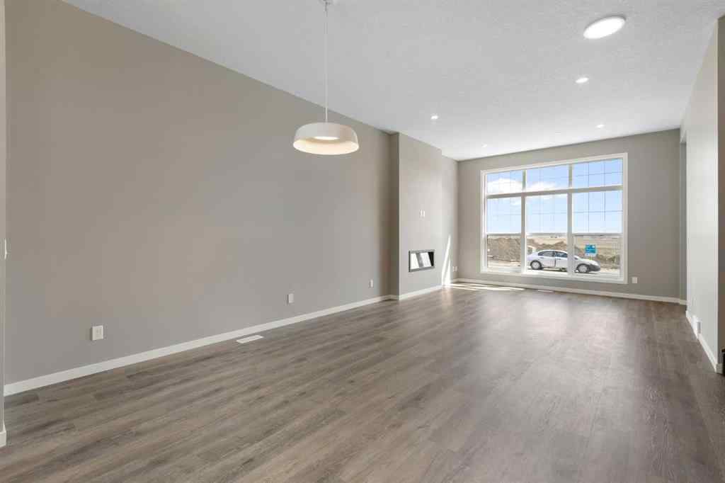 MLS® A2258581 - 415 Hotchkiss Manor SE in Hotchkiss Calgary, Residential