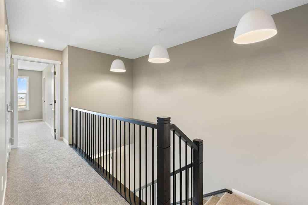 MLS® A2258581 - 415 Hotchkiss Manor SE in Hotchkiss Calgary, Residential