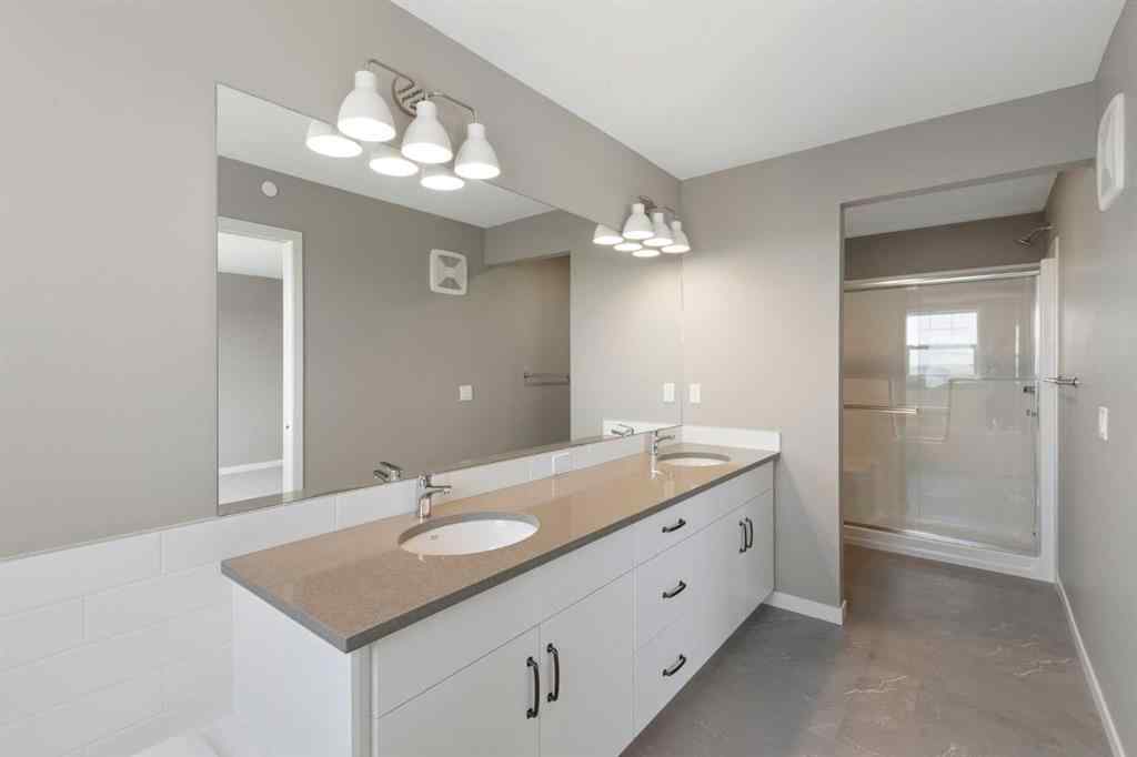 MLS® A2258581 - 415 Hotchkiss Manor SE in Hotchkiss Calgary, Residential