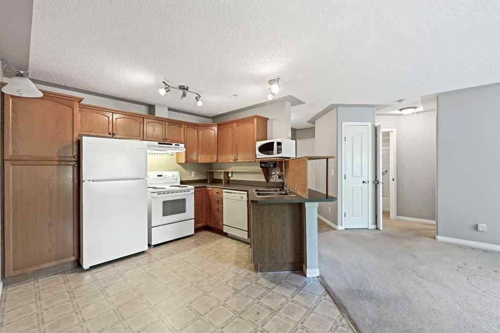 MLS® A2258582 - Unit #212 369 Rocky Vista Park NW in Rocky Ridge Calgary, Residential
