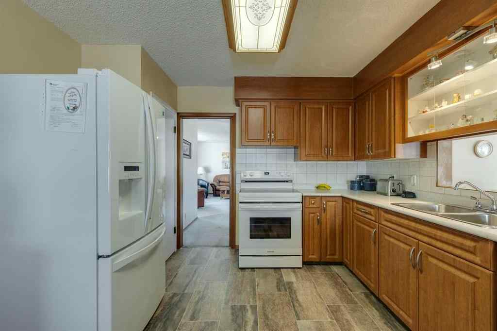 MLS® A2258615 - 4735 Chapel Road NW in Charleswood Calgary, Residential