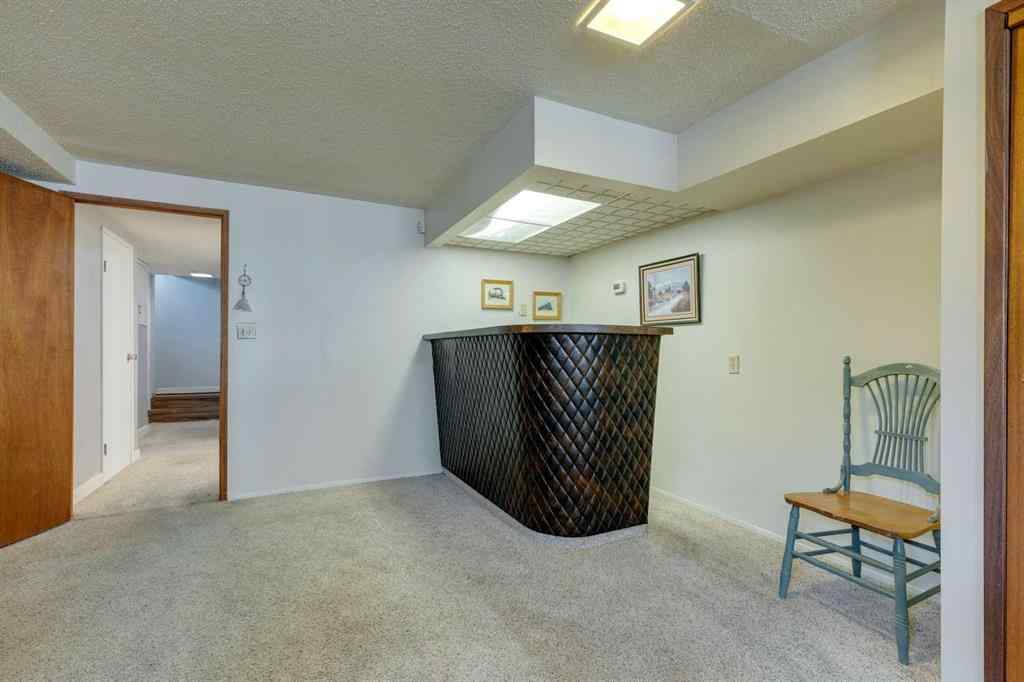 MLS® A2258615 - 4735 Chapel Road NW in Charleswood Calgary, Residential