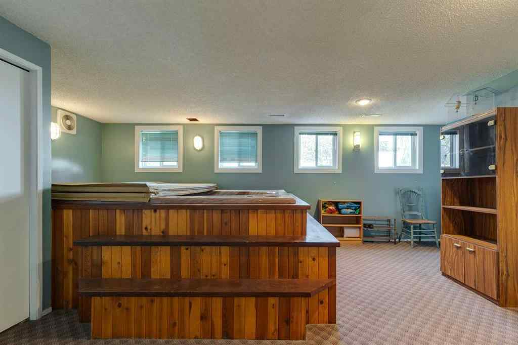 MLS® A2258615 - 4735 Chapel Road NW in Charleswood Calgary, Residential