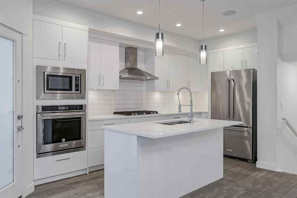 MLS® A2258616 - Unit #2 136 22 Avenue NE in Tuxedo Park Calgary, Residential