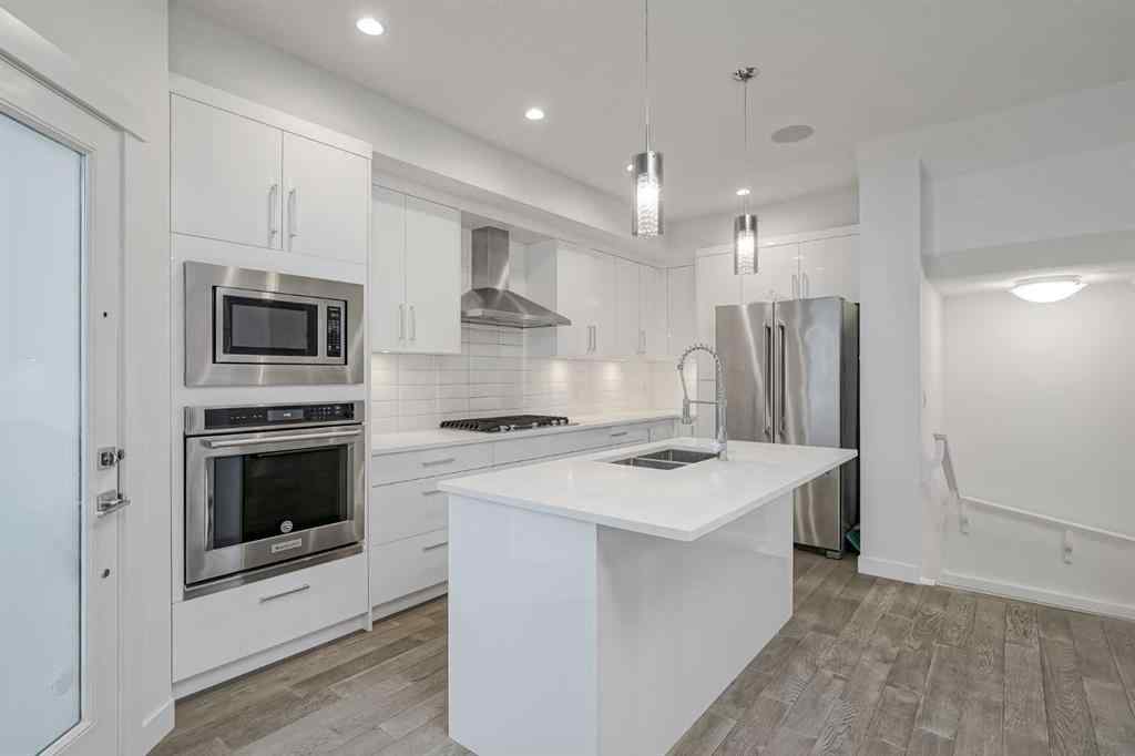 MLS® A2258616 - Unit #2 136 22 Avenue NE in Tuxedo Park Calgary, Residential