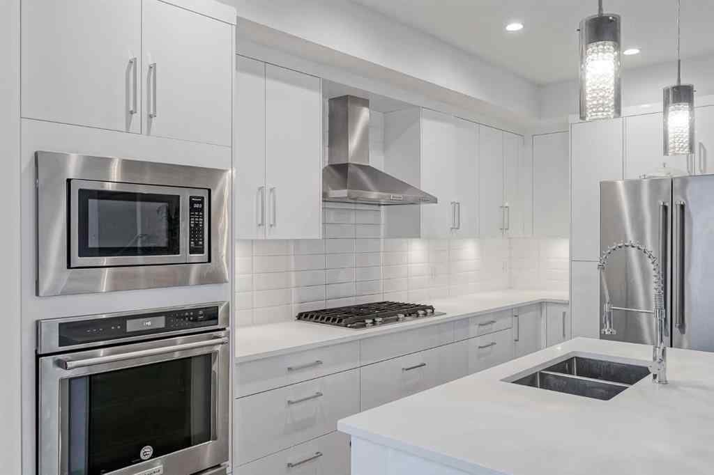 MLS® A2258616 - Unit #2 136 22 Avenue NE in Tuxedo Park Calgary, Residential