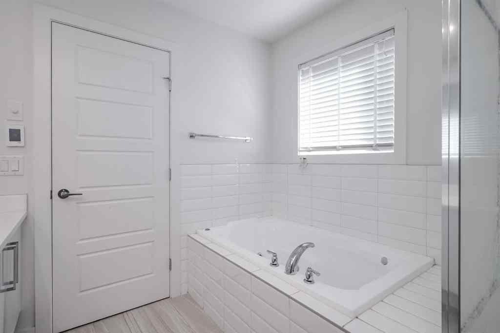 MLS® A2258616 - Unit #2 136 22 Avenue NE in Tuxedo Park Calgary, Residential