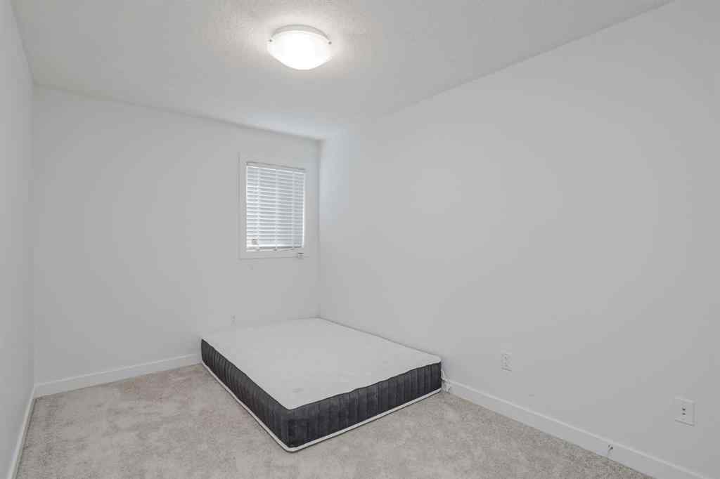 MLS® A2258616 - Unit #2 136 22 Avenue NE in Tuxedo Park Calgary, Residential