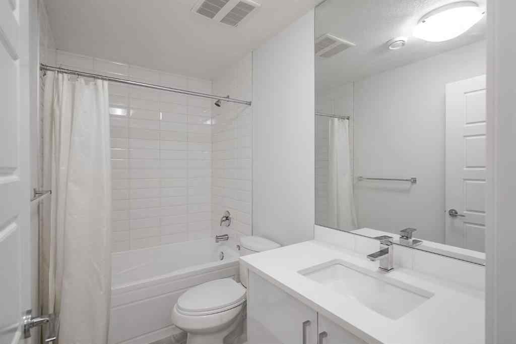 MLS® A2258616 - Unit #2 136 22 Avenue NE in Tuxedo Park Calgary, Residential