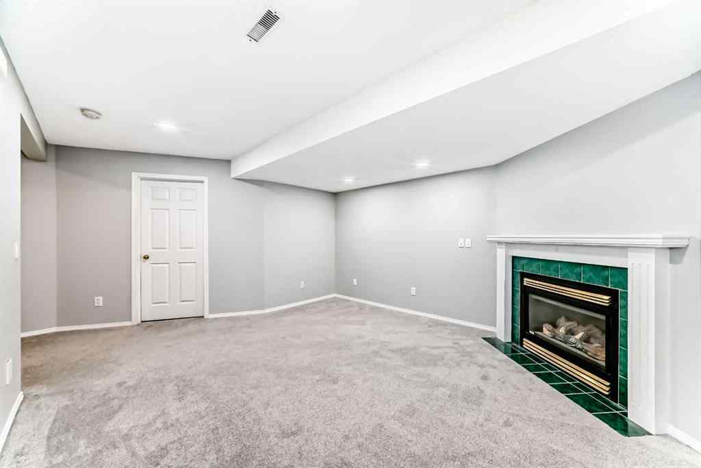 MLS® A2258620 - 215 Harvest Gold Place NE in Harvest Hills Calgary, Residential
