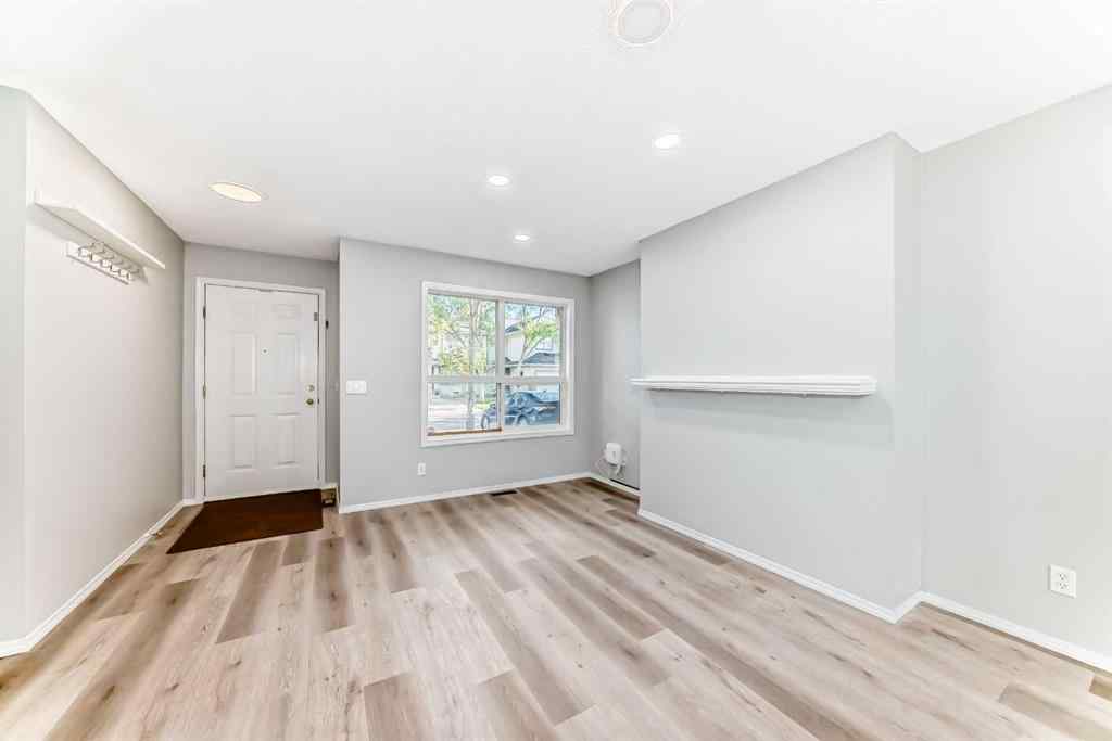 MLS® A2258620 - 215 Harvest Gold Place NE in Harvest Hills Calgary, Residential