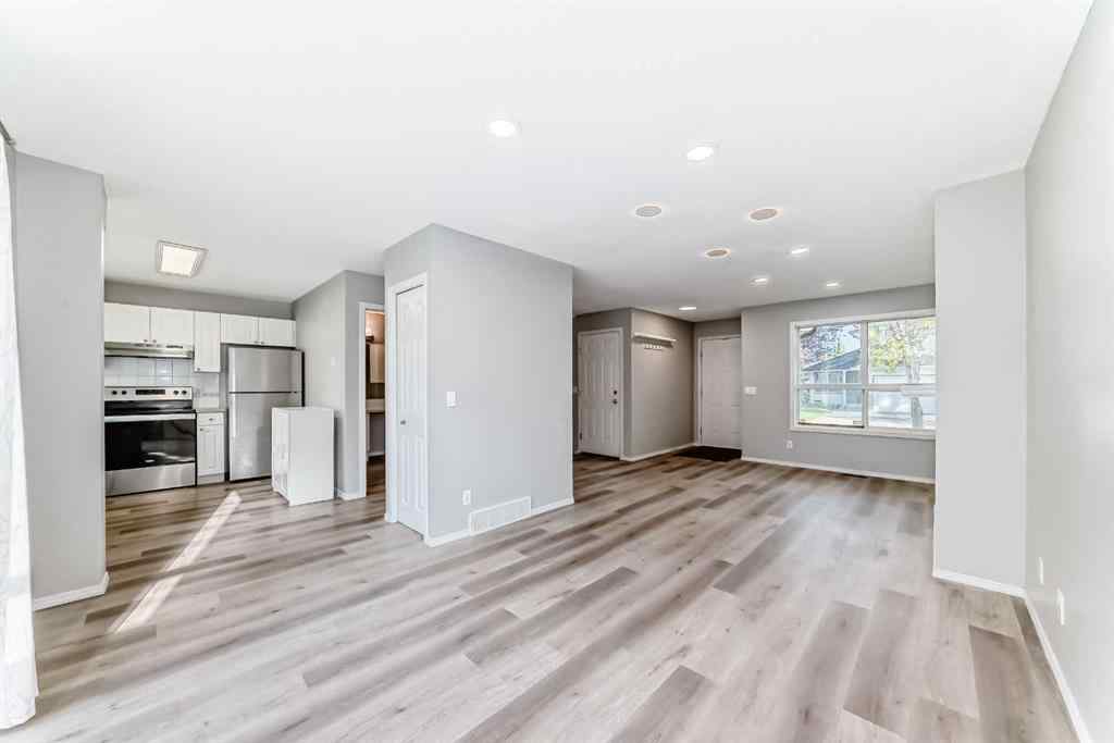 MLS® A2258620 - 215 Harvest Gold Place NE in Harvest Hills Calgary, Residential