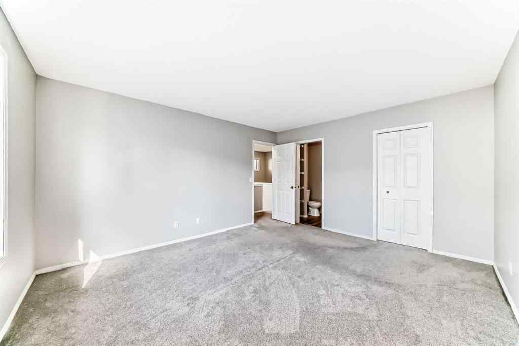 MLS® A2258620 - 215 Harvest Gold Place NE in Harvest Hills Calgary, Residential