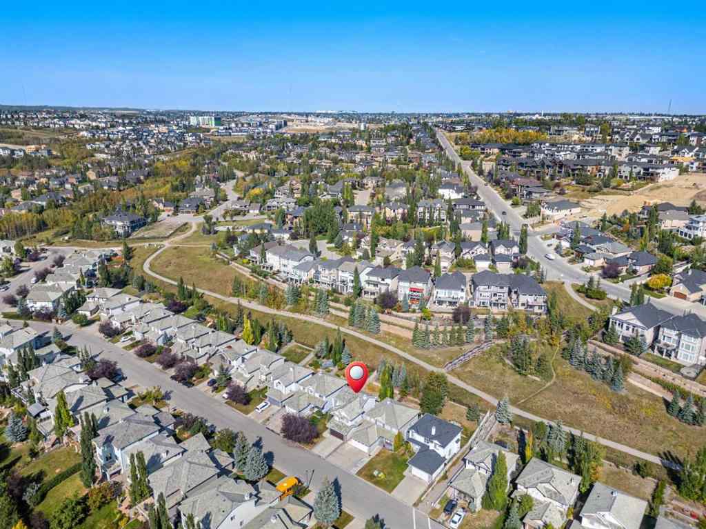 MLS® A2258636 - 7826 Springbank Way SW in Springbank Hill Calgary, Residential