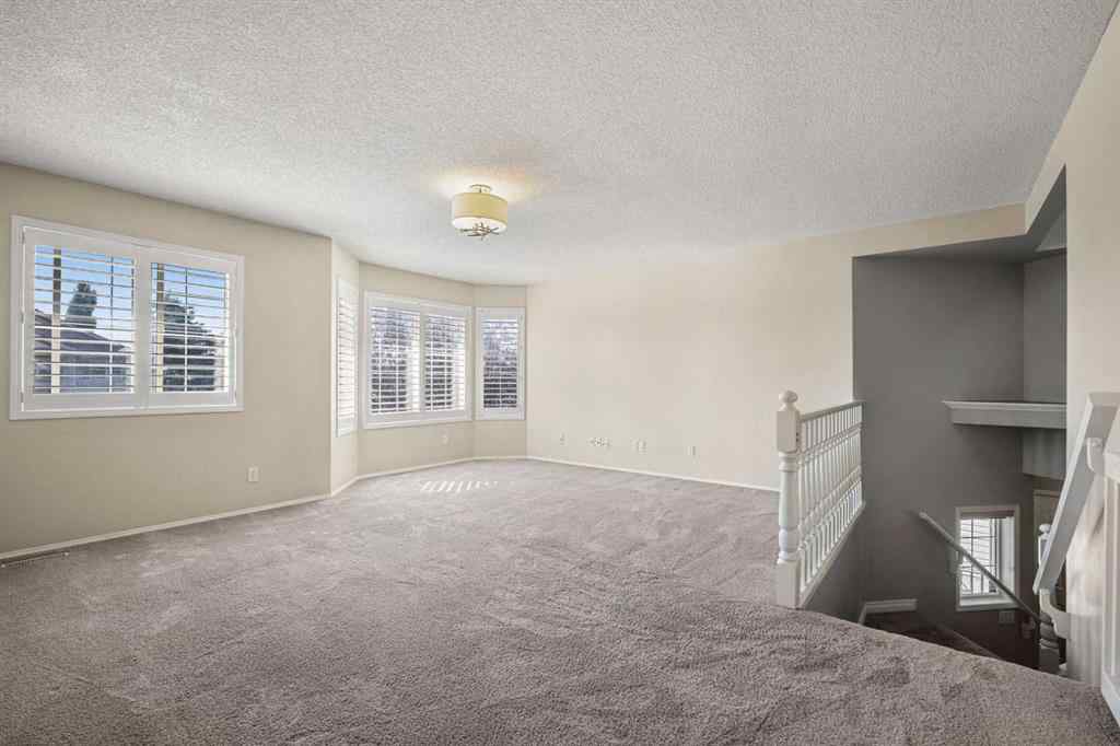 MLS® A2258636 - 7826 Springbank Way SW in Springbank Hill Calgary, Residential