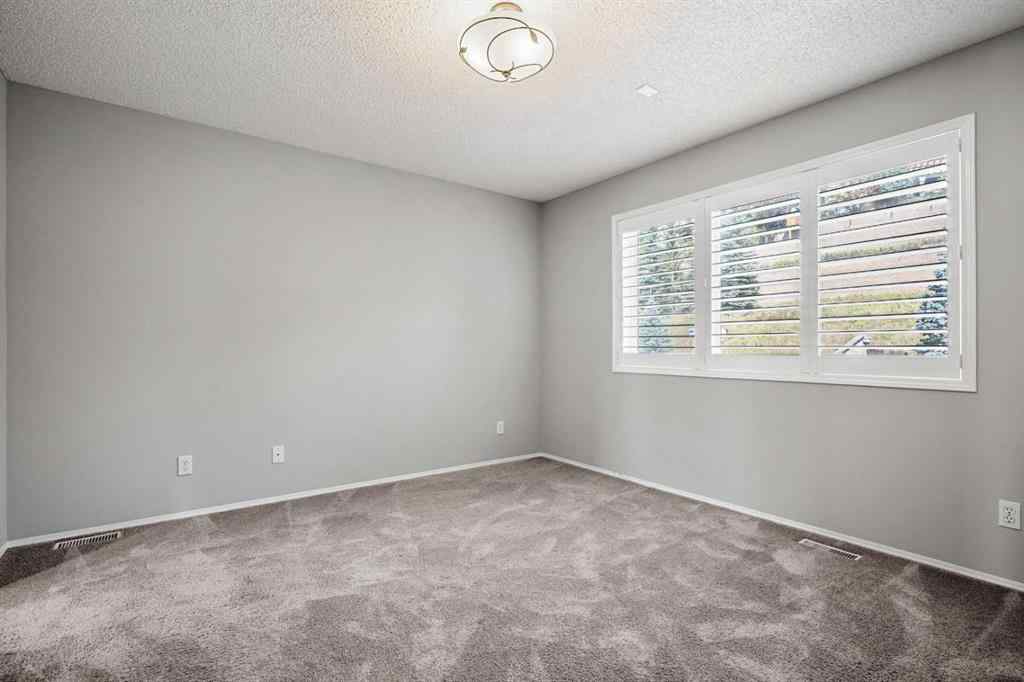 MLS® A2258636 - 7826 Springbank Way SW in Springbank Hill Calgary, Residential