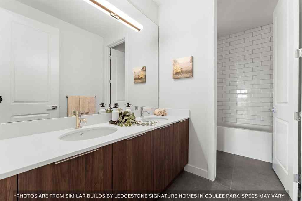 MLS® A2258648 - 91 Coulee Crescent SW in Cougar Ridge Calgary, Residential