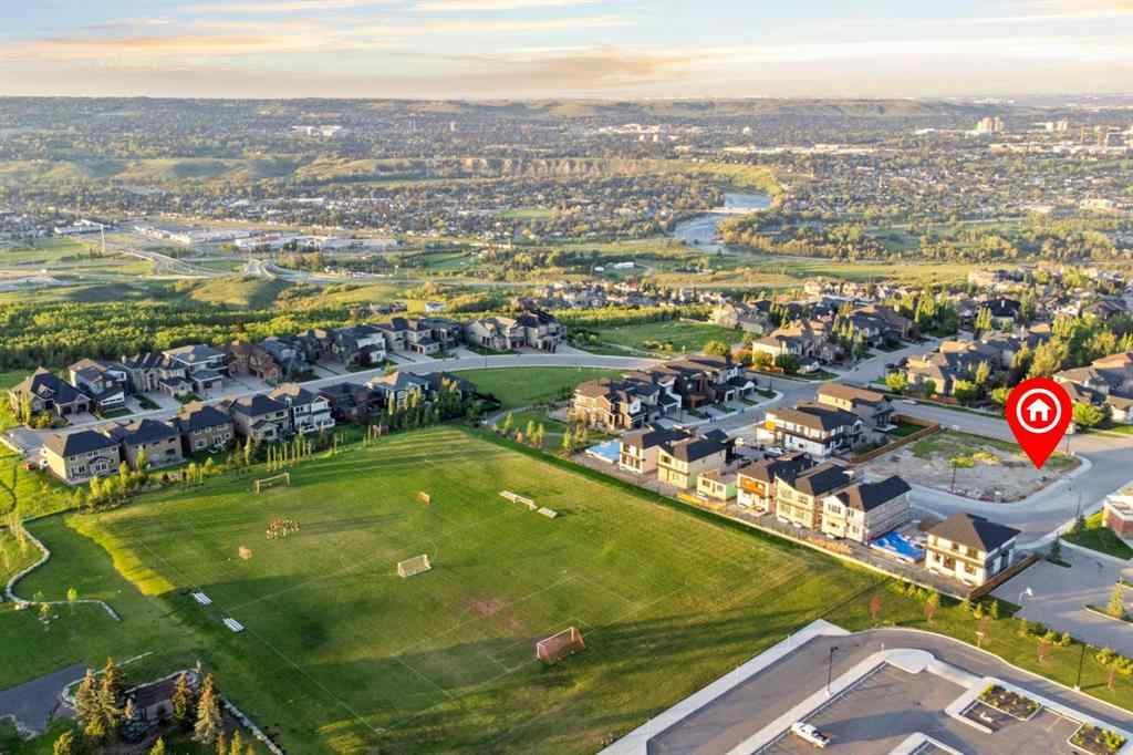 MLS® A2258648 - 91 Coulee Crescent SW in Cougar Ridge Calgary, Residential
