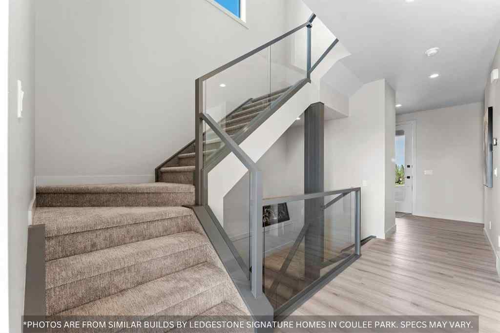 MLS® A2258648 - 91 Coulee Crescent SW in Cougar Ridge Calgary, Residential
