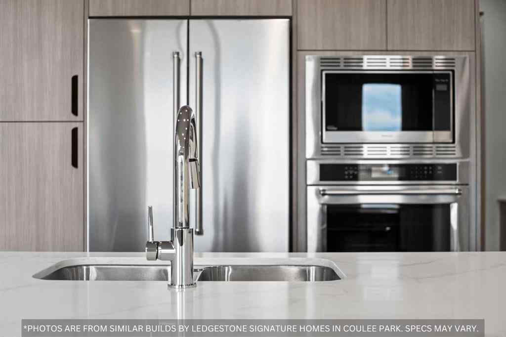 MLS® A2258648 - 91 Coulee Crescent SW in Cougar Ridge Calgary, Residential