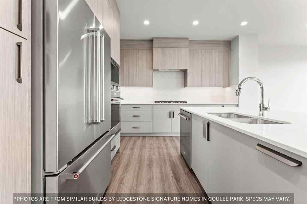 MLS® A2258648 - 91 Coulee Crescent SW in Cougar Ridge Calgary, Residential