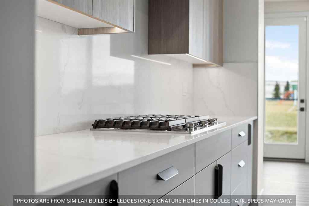 MLS® A2258648 - 91 Coulee Crescent SW in Cougar Ridge Calgary, Residential