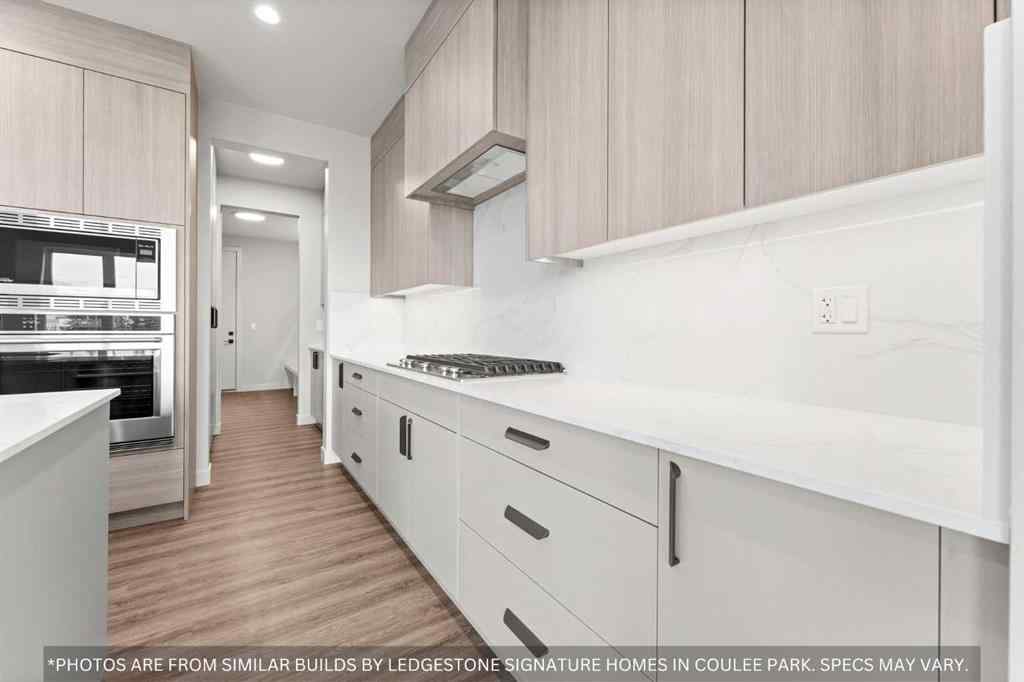MLS® A2258648 - 91 Coulee Crescent SW in Cougar Ridge Calgary, Residential