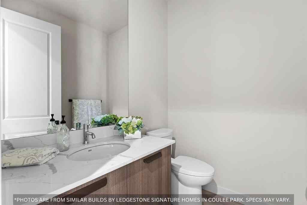 MLS® A2258648 - 91 Coulee Crescent SW in Cougar Ridge Calgary, Residential