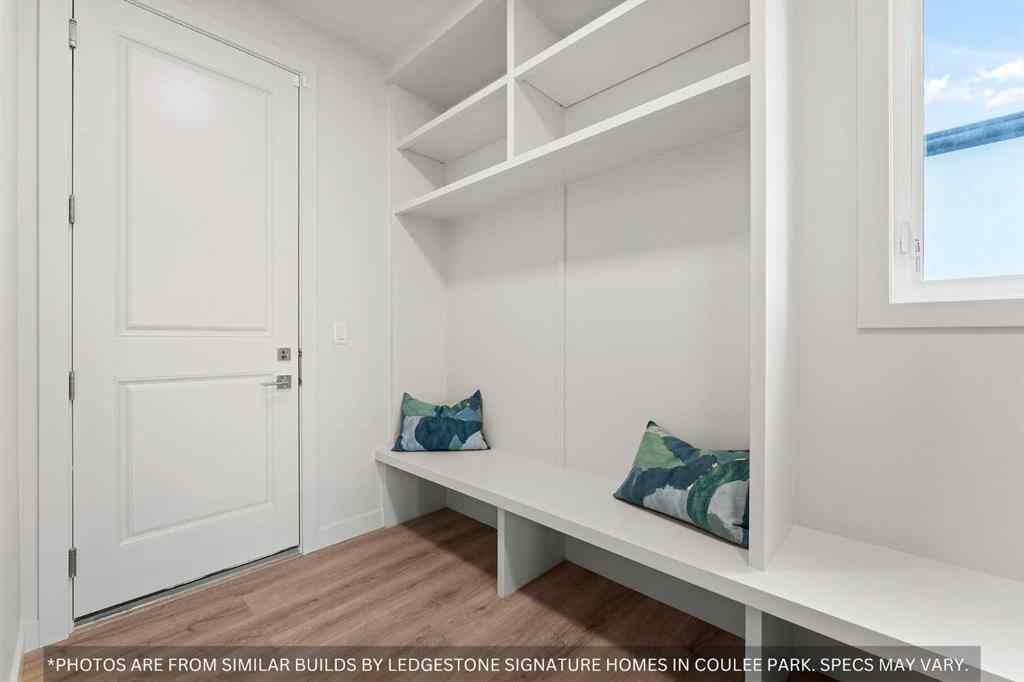 MLS® A2258648 - 91 Coulee Crescent SW in Cougar Ridge Calgary, Residential