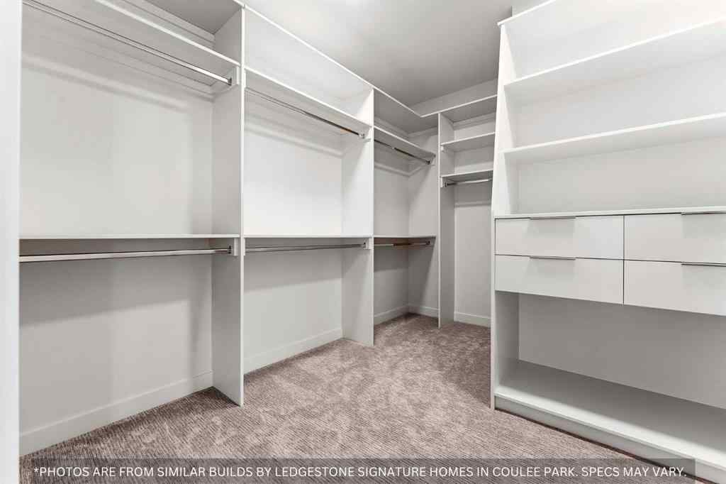 MLS® A2258648 - 91 Coulee Crescent SW in Cougar Ridge Calgary, Residential