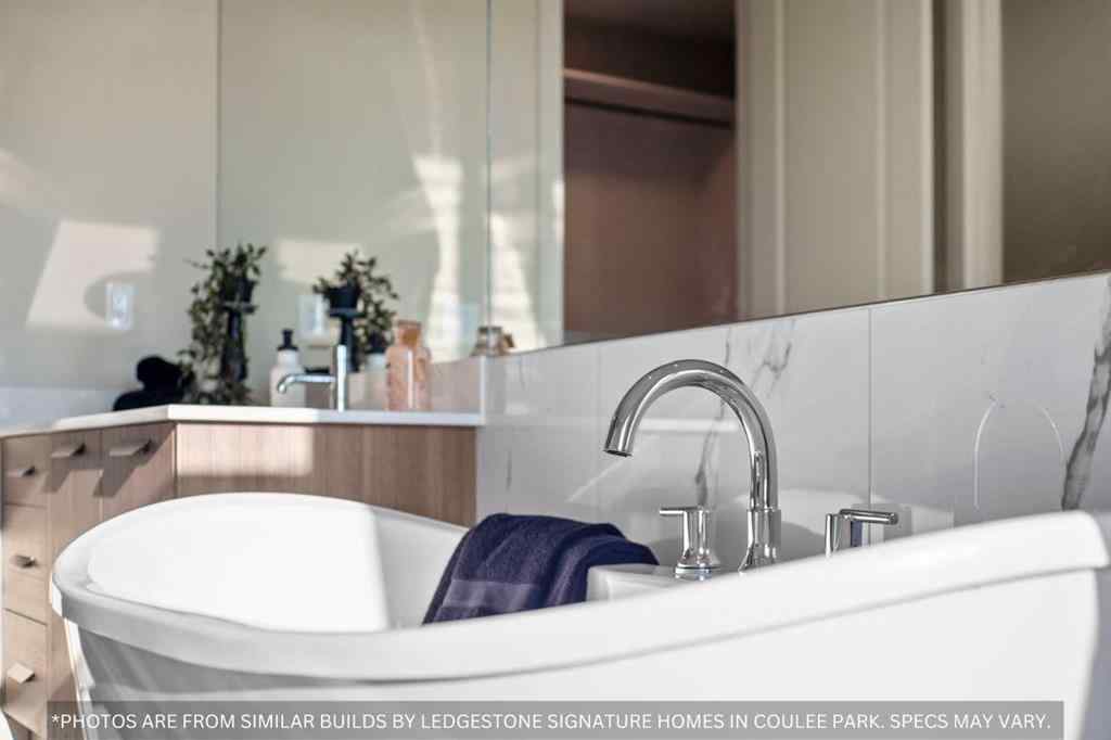 MLS® A2258648 - 91 Coulee Crescent SW in Cougar Ridge Calgary, Residential