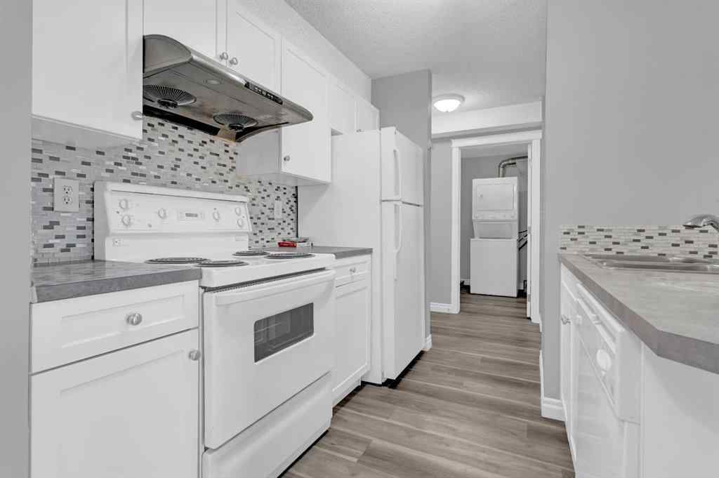 MLS® A2258662 - Unit #103 5555 Falsbridge Drive NE in Falconridge Calgary, Residential