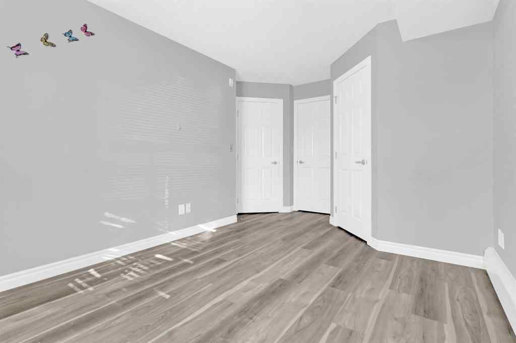 MLS® A2258662 - Unit #103 5555 Falsbridge Drive NE in Falconridge Calgary, Residential
