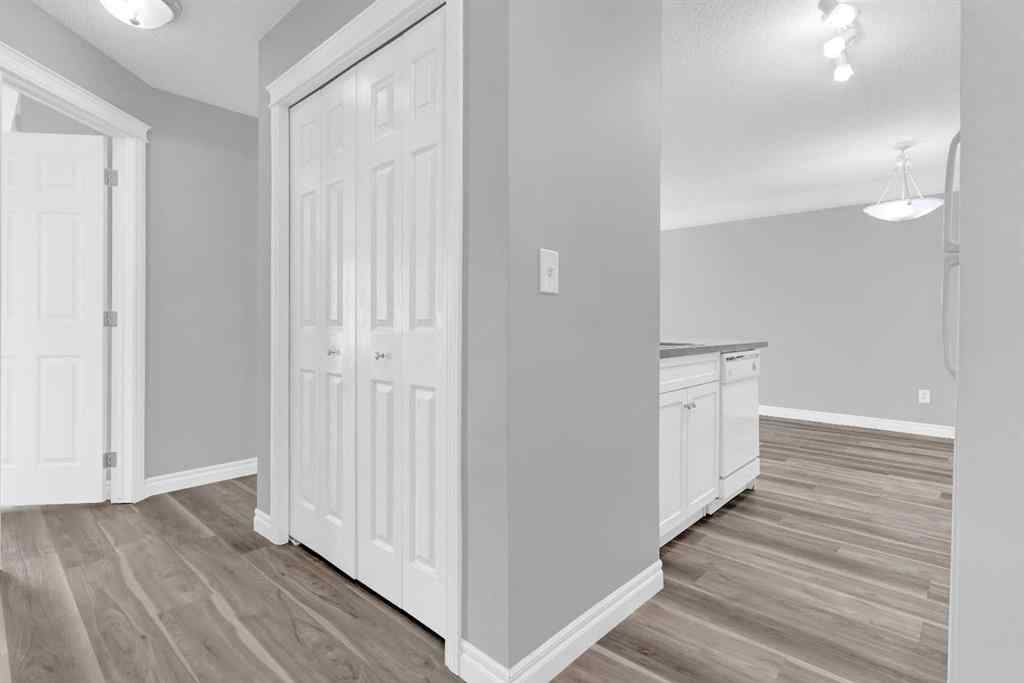 MLS® A2258662 - Unit #103 5555 Falsbridge Drive NE in Falconridge Calgary, Residential